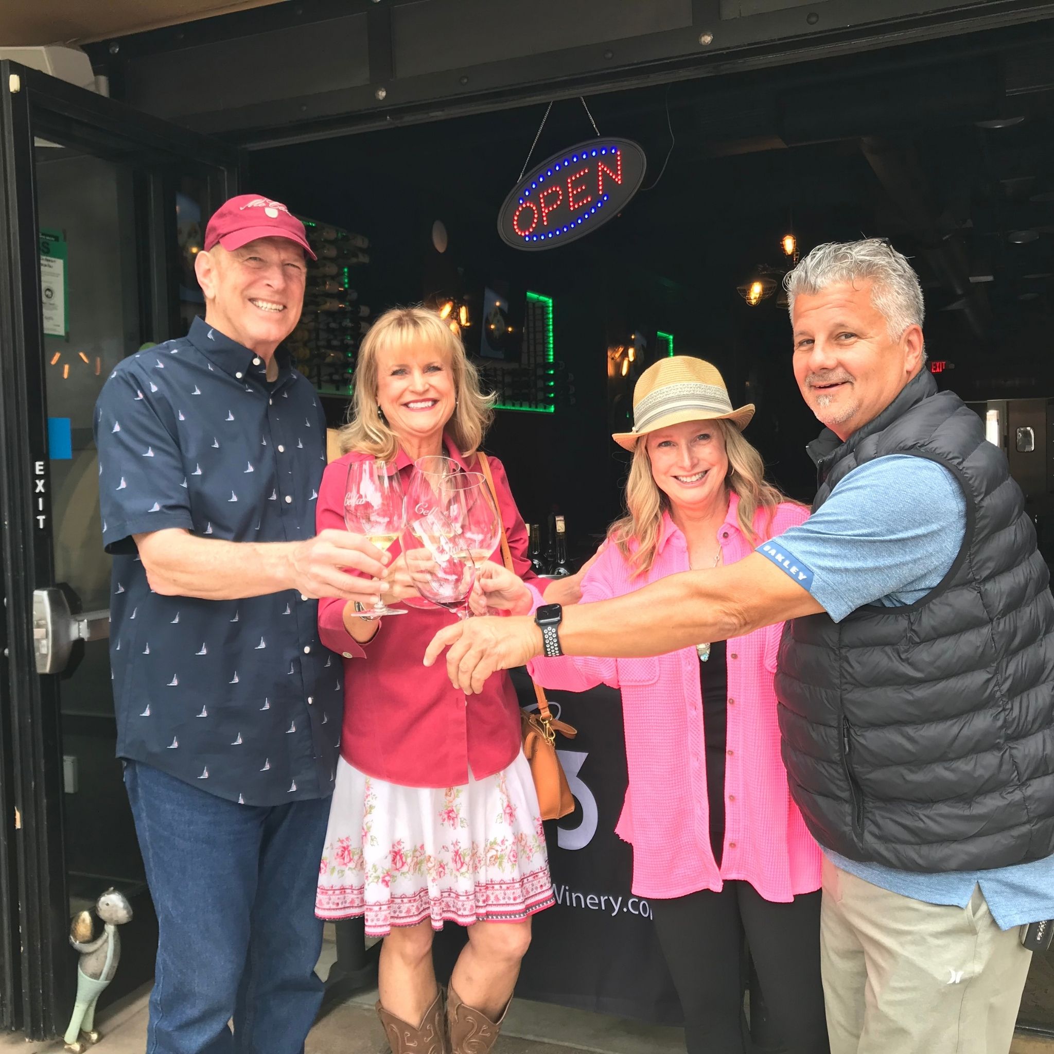Darin and Gail and two wine club members at a club pick up party